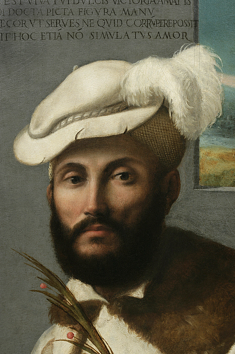 Portrait of a Young Man Holding a Palm Slider Image 2